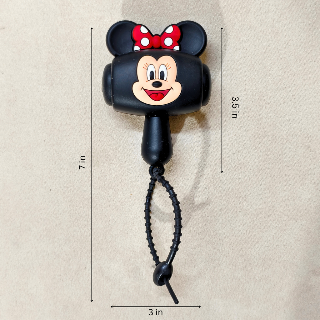 A black Mickey Mouse-shaped retractable pole or tool with a red polka-dot bow, shown on a beige background with dimension lines indicating 7 in height, 3.5 in vertical width, and 3 in horizontal width.