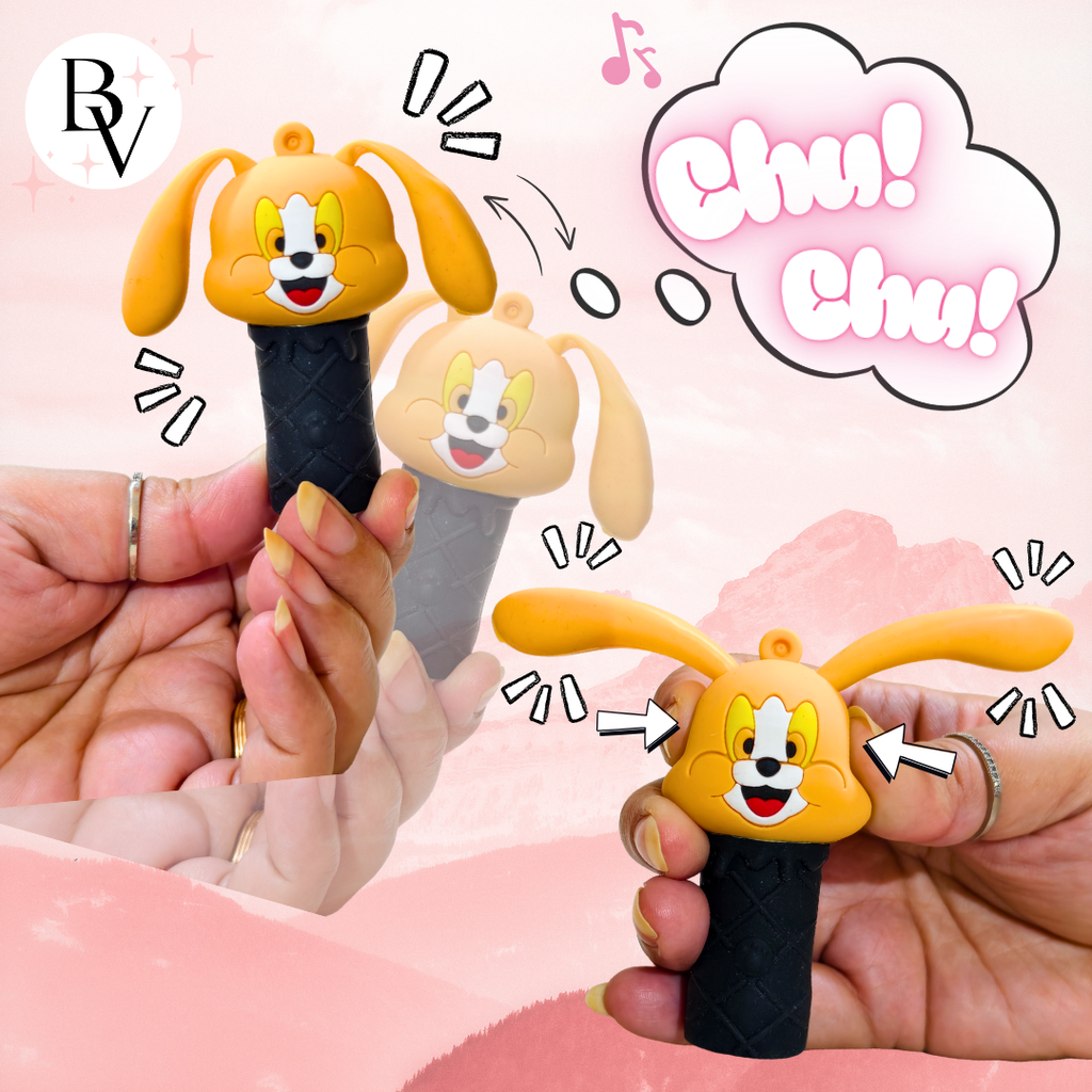 Cartoon character-shaped pen holders with 'Chu! Chu!' sound effect on a pink background