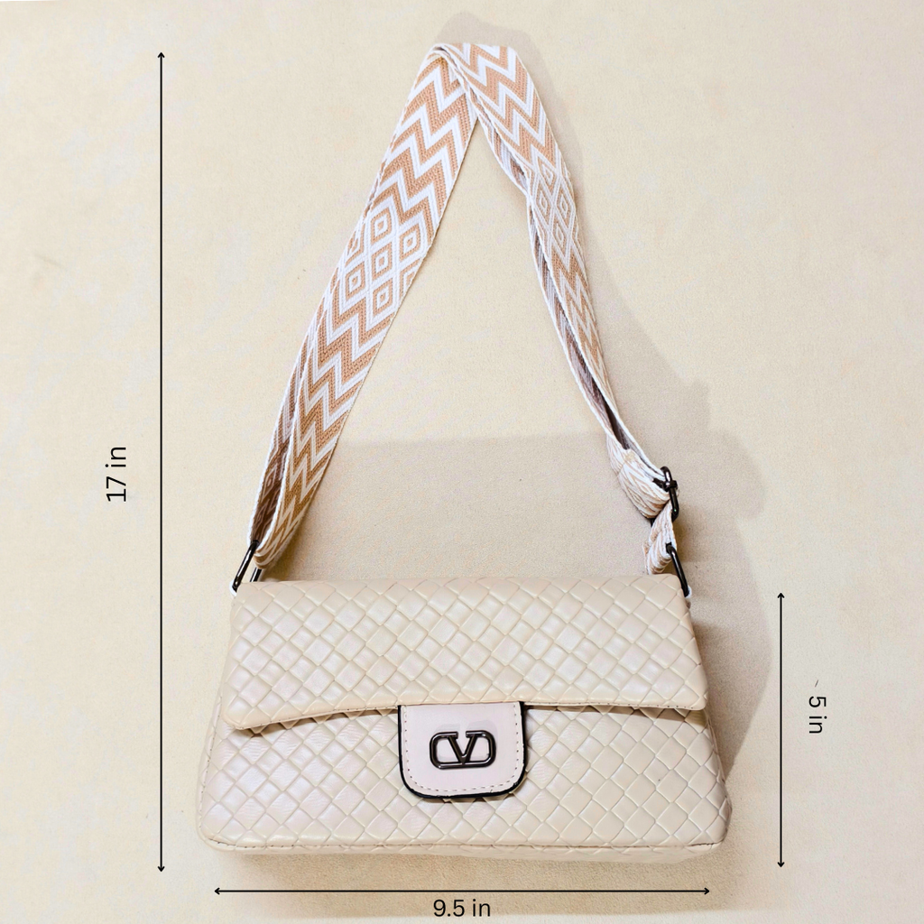 White quilted handbag with a patterned strap, shown with measurements on a beige background