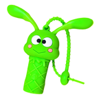 Green toy with a face and antenna on a white background
