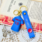 
Virat Keyring  With Props On  Crochet Background.