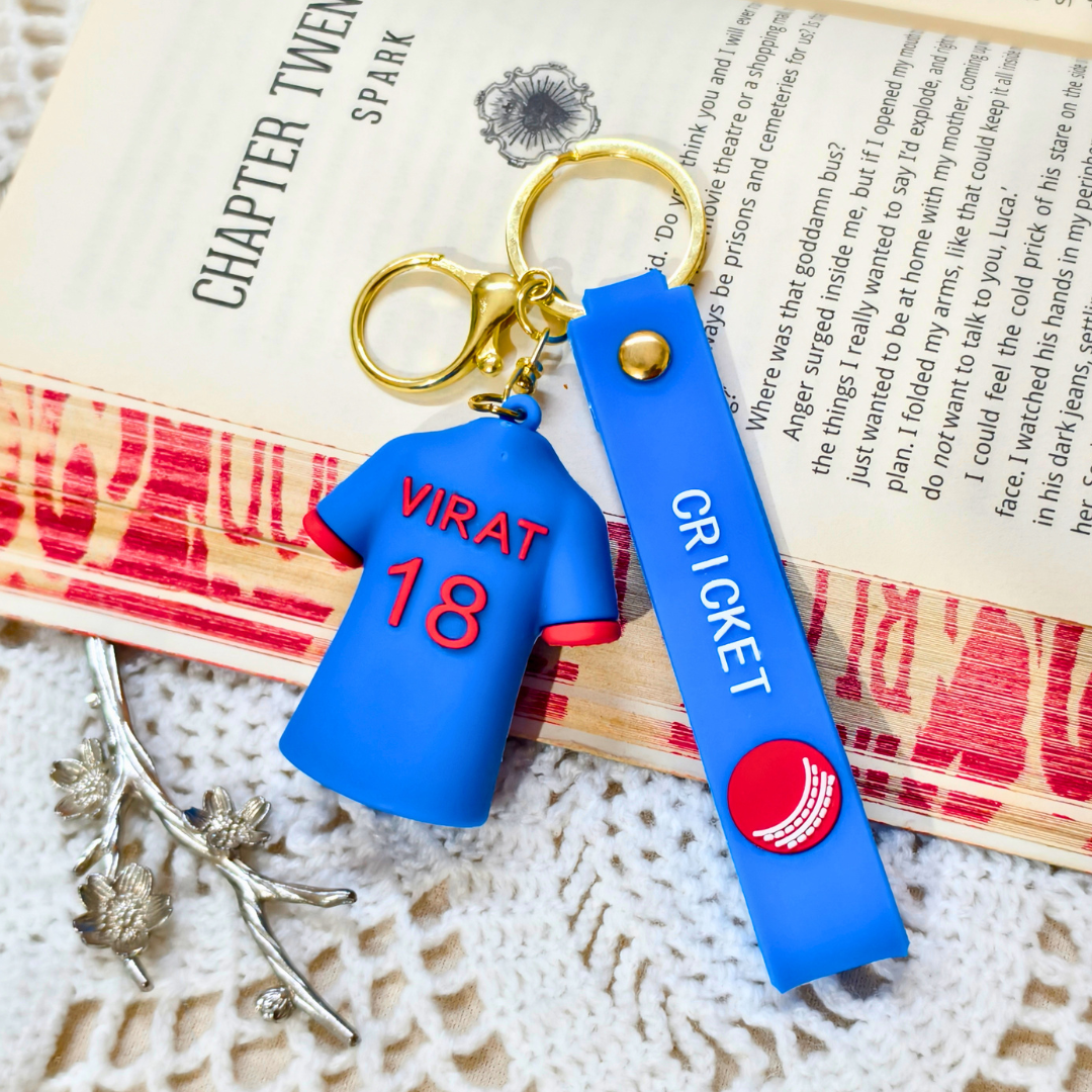 
Virat Keyring  With Props On  Crochet Background.