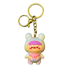 Colorful cartoon character keychain with a gold ring on a white background