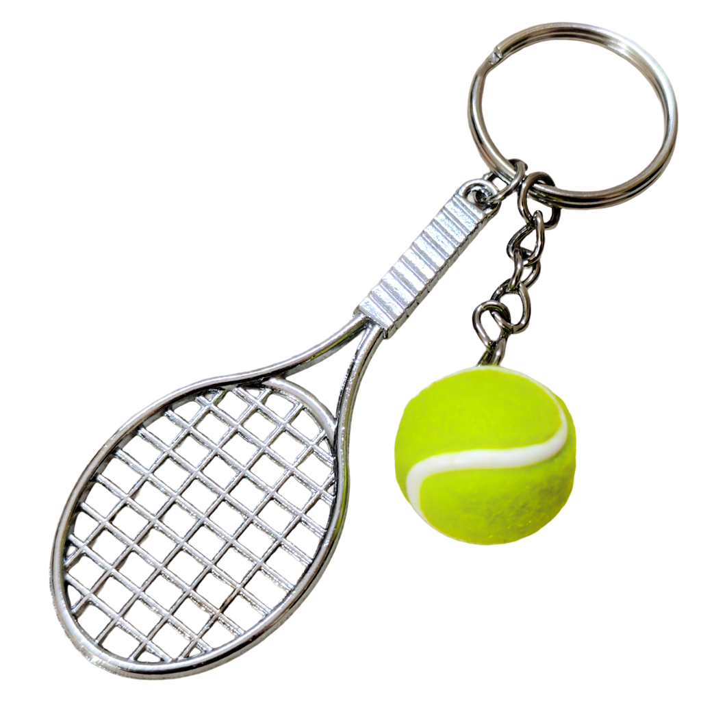 A novelty keychain featuring a silver metal tennis racket and a bright yellow tennis ball charm, set against a plain white background.