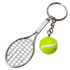 A novelty keychain featuring a silver metal tennis racket and a bright yellow tennis ball charm, set against a plain white background.