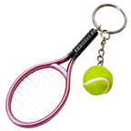 A novelty keychain shaped like a pink and purple tennis racket with a small yellow tennis ball charm attached by a silver chain, shown on a plain white background.