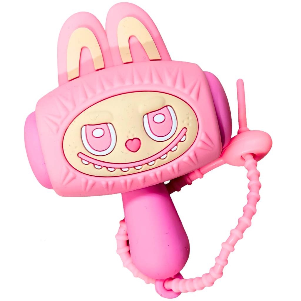 A pink toy phone shaped like a cartoon bunny face, with bunny ears on top, a smiling face graphic, and a coiled cord, shown on a plain white background.
