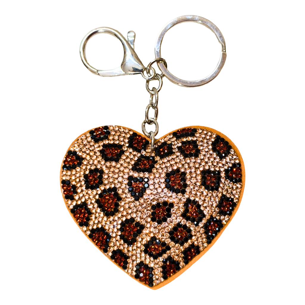 Heart-shaped keychain with leopard print pattern on a white background