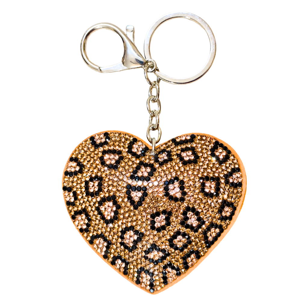 Heart-shaped keychain with leopard print pattern on a white background