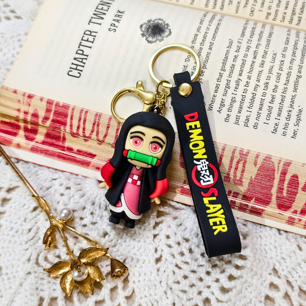 Keychain with character design on a book page