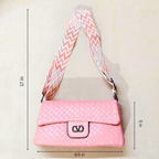 Pink quilted handbag with a patterned strap, shown with measurements on a light background