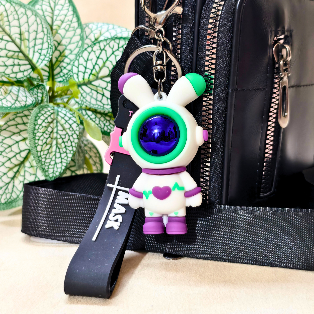 Bunny Astronaut Keyring Attached With Purse On Beige Background