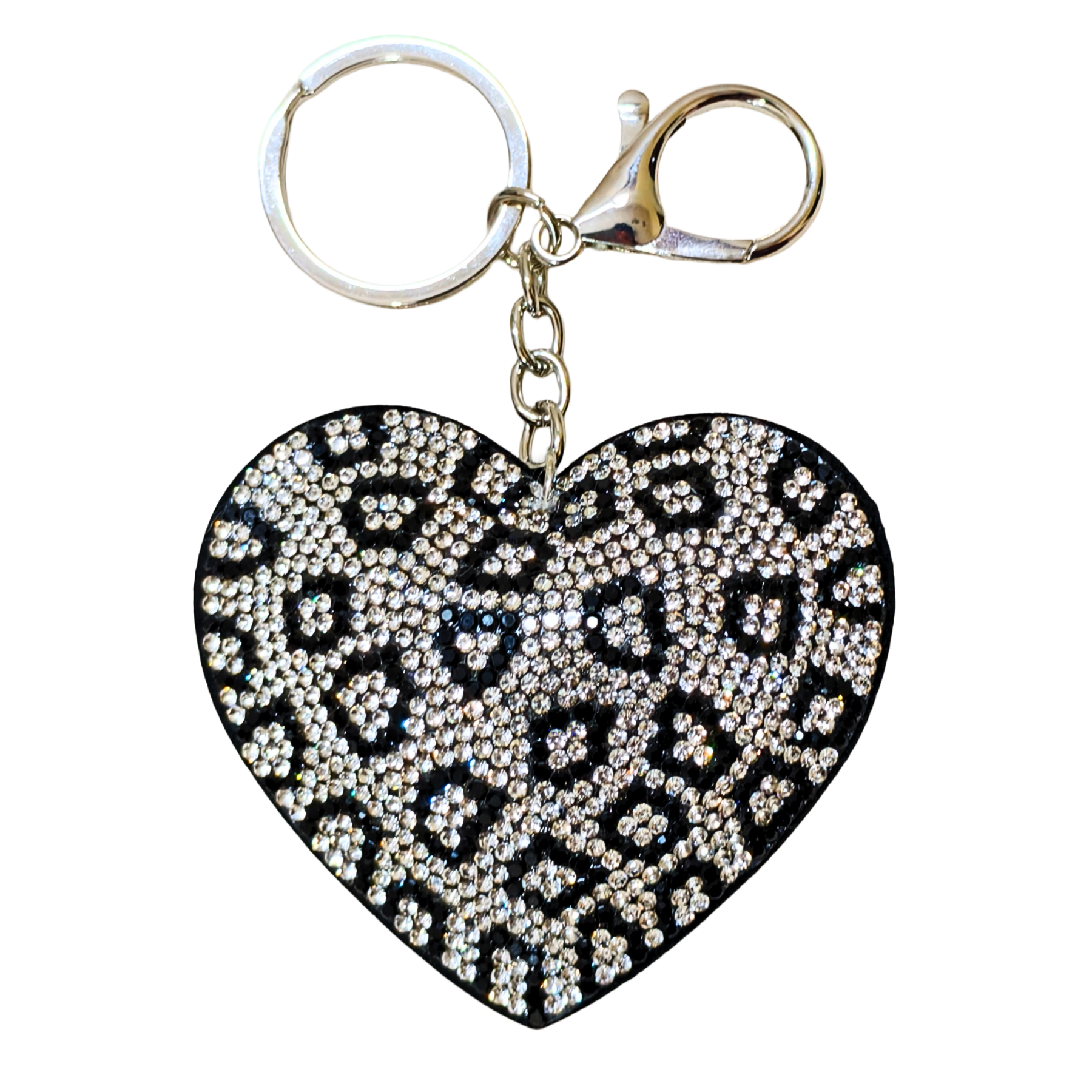 Heart-shaped keychain with black and white pattern on a white background