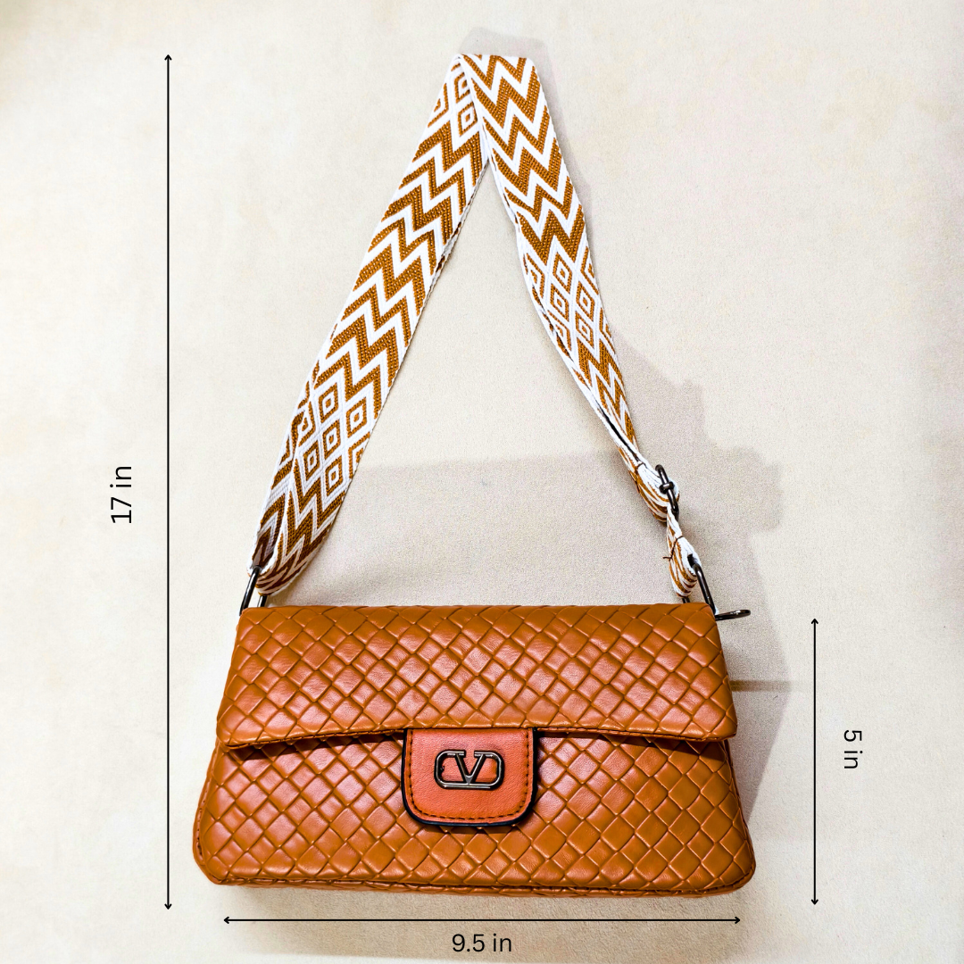 Brown woven handbag with a patterned strap on a white background, showing measurements.