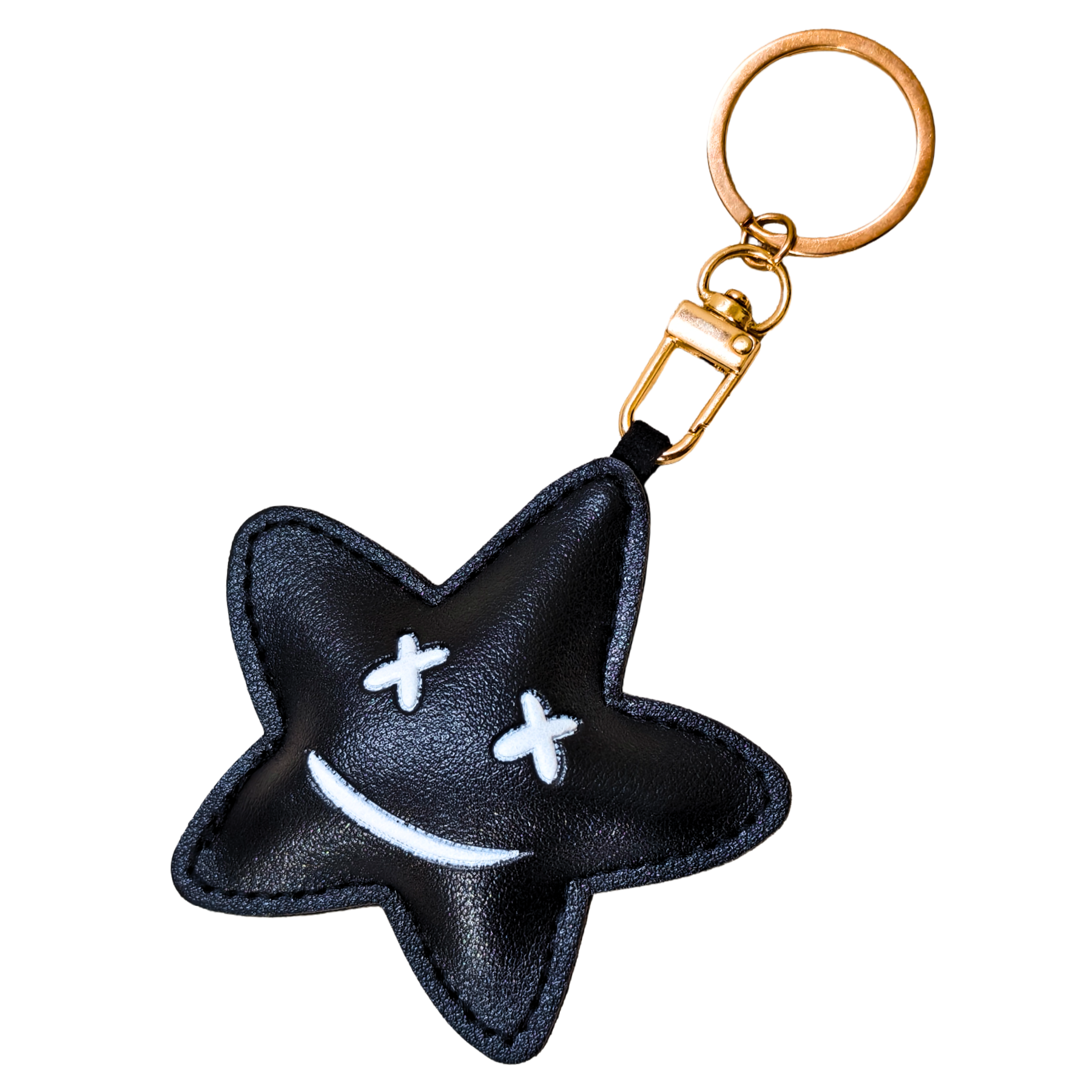 Stitched black star keychain against a white background