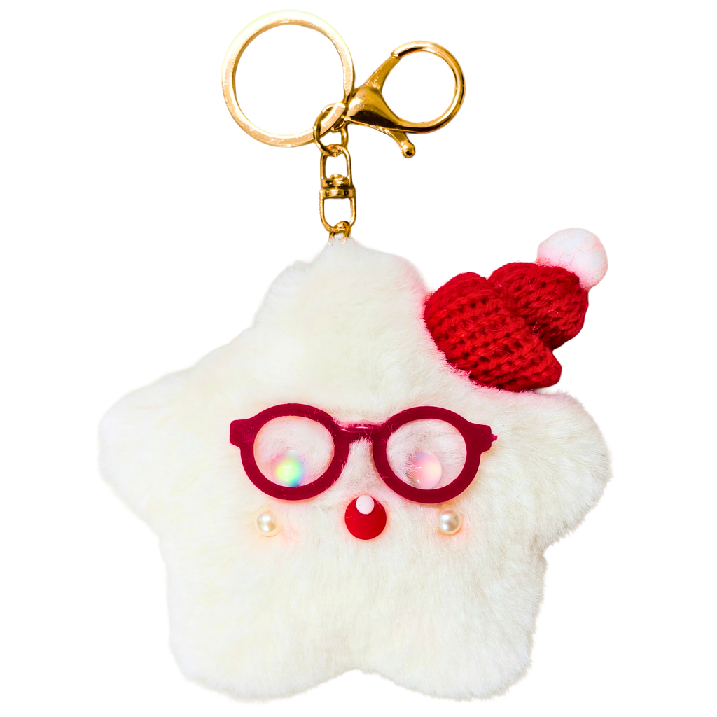 A white fluffy star-shaped keychain charm with a red knit Santa hat, red glasses, and a gold clasp on a plain white background.