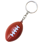 A football-shaped keychain with a textured brown body, white laces, and a silver metal key ring and chain, isolated on a white background.