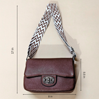 Brown shoulder bag with a patterned strap on a beige background, showing measurements.