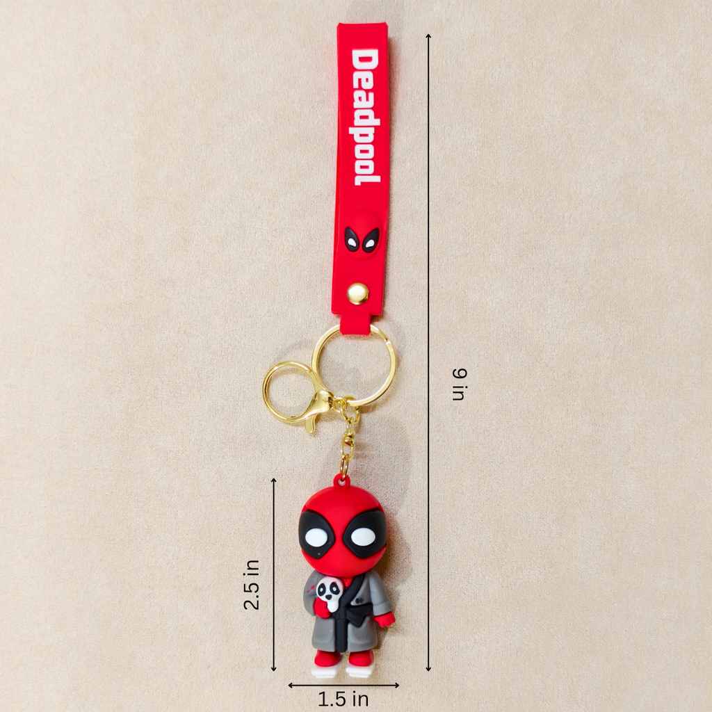 Deadpool keychain with dimensions on a beige background