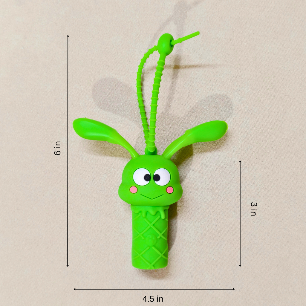 Green toy with measurements on a beige background