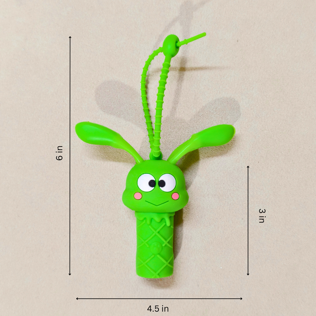 Green toy with measurements on a beige background