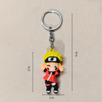 Keychain of a character with measurements on a beige background