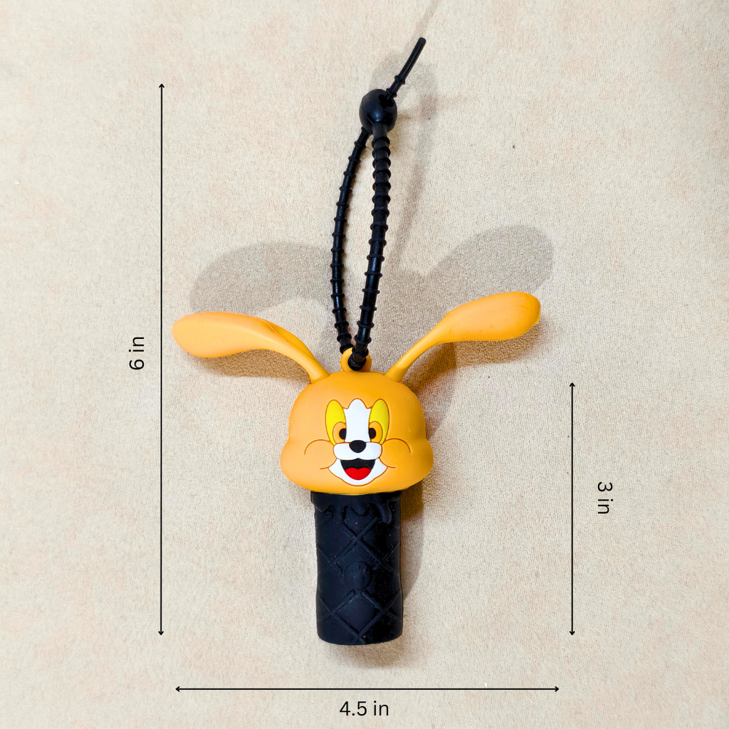 Cartoon character keychain with measurements on a beige background