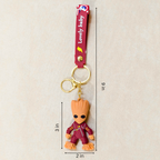 Keychain with character measurement details on a beige background