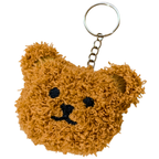 A small plush teddy bear head keychain in a warm tan-brown fuzzy fabric, with black embroidered eyes and nose, attached to a silver metal key ring and chain on a plain white background.