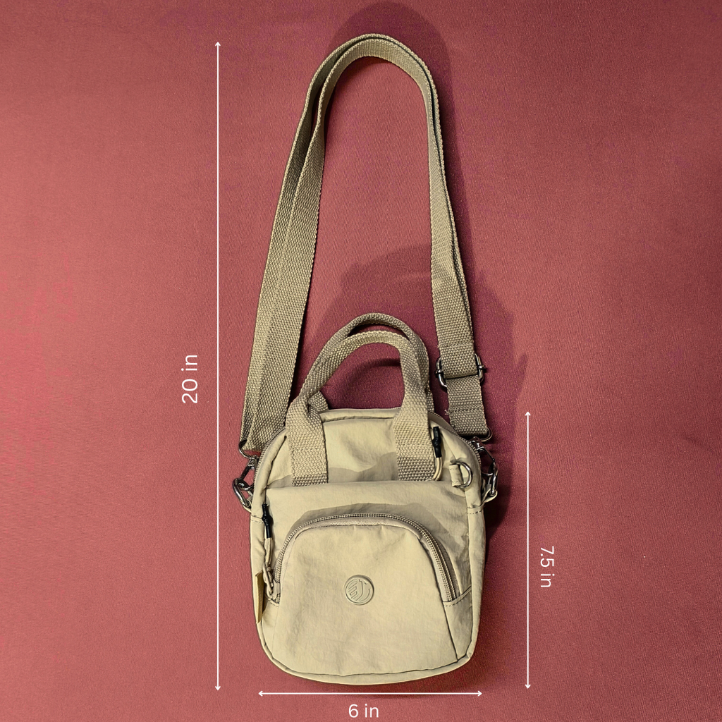 Beige shoulder bag with measurements on a red background