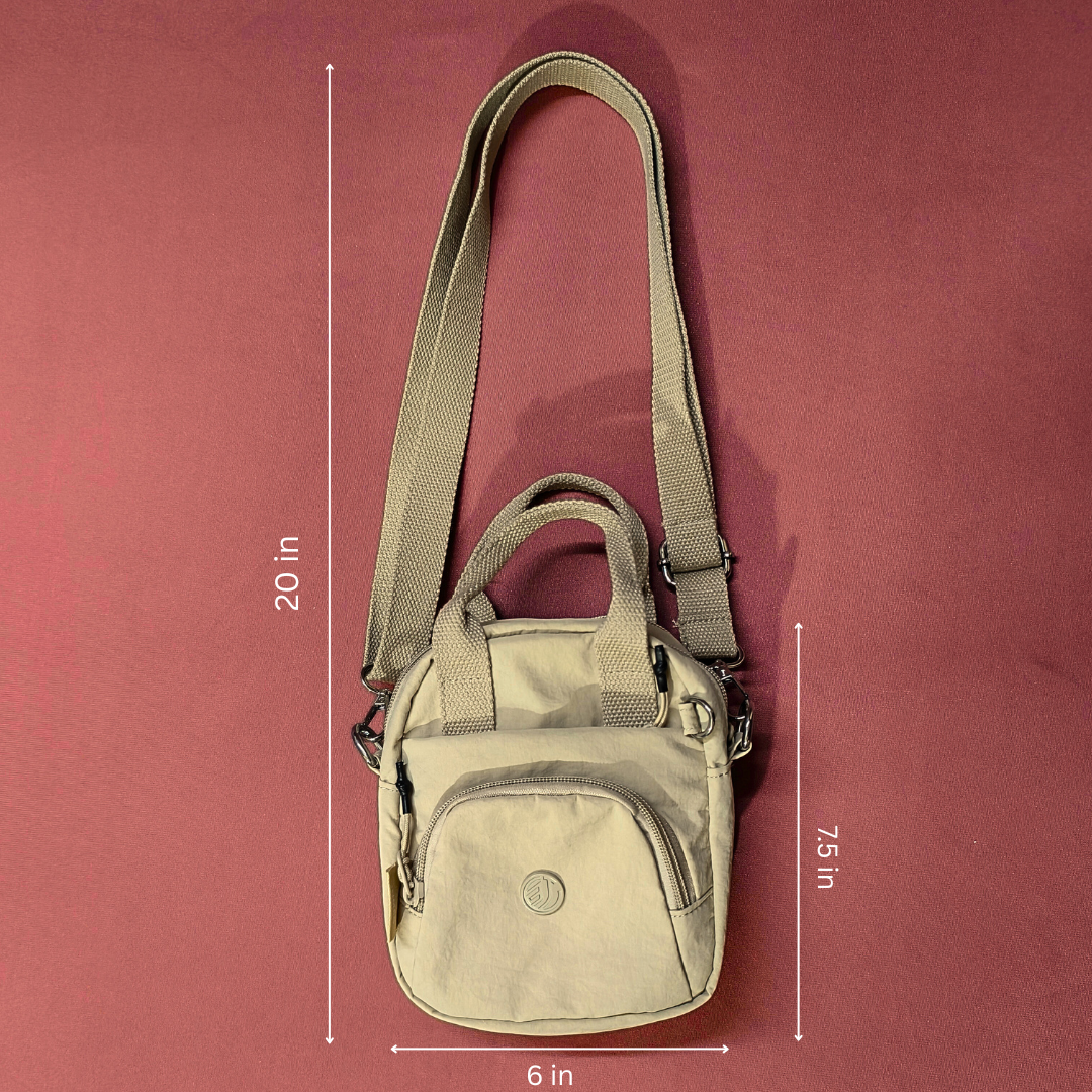 Beige shoulder bag with measurements on a red background