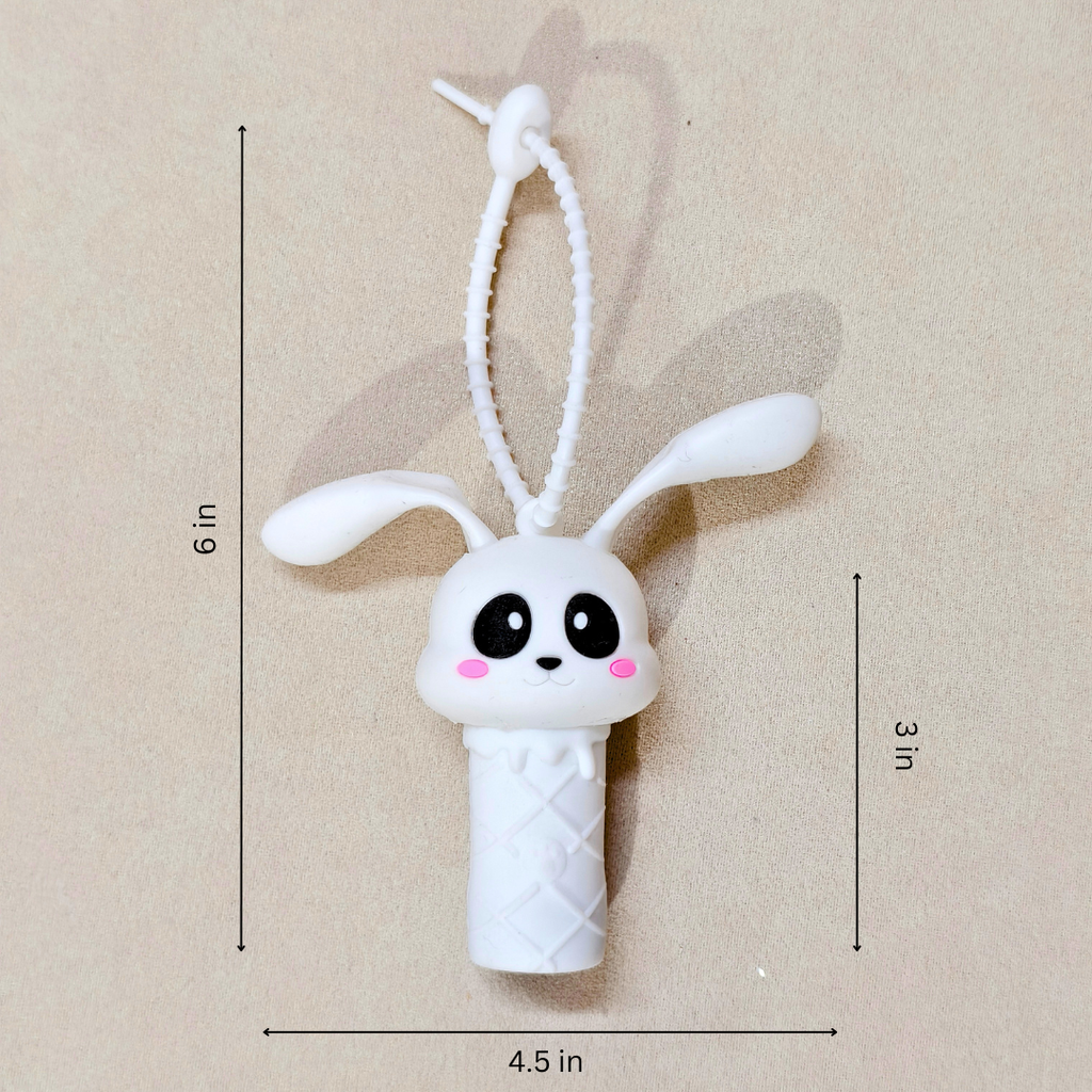 White bunny-shaped toy with measurements on a beige background