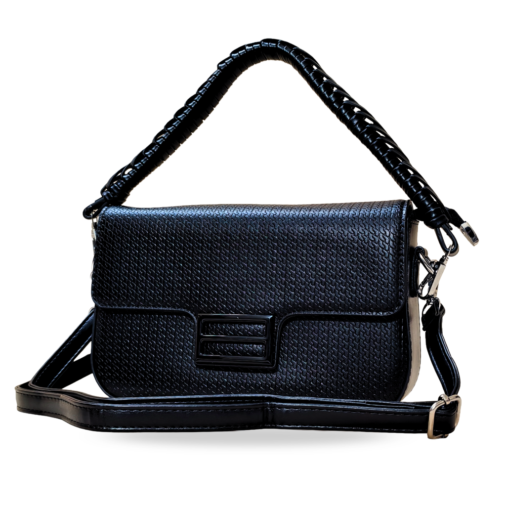 Black leather handbag with a strap on a white background