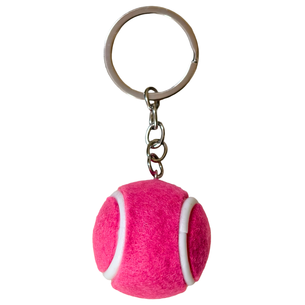 A pink tennis ball keychain charm with a silver metal split ring and chain, shown against a plain white background.