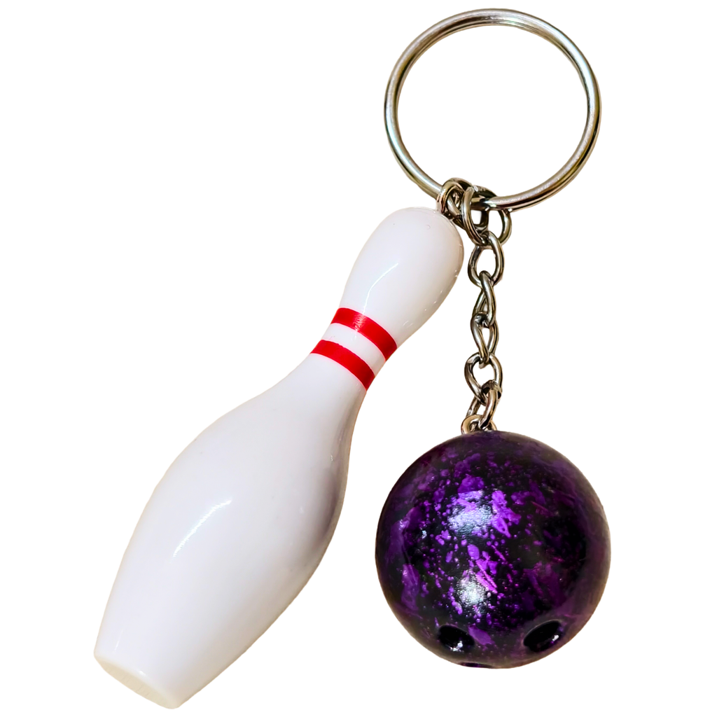 Sporty Bowling Keychain along with Silver chain and ring with Ball on Plain White Background.