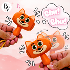 An orange cat-shaped hand toy being held by two hands, with cartoon-style sound effects and a thought bubble reading 'Chu! Chu!'. The background is a soft pink gradient with decorative doodles.