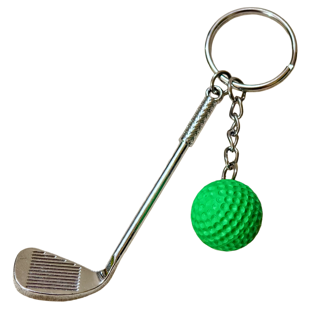 A novelty golf keychain featuring a silver metal golf club head and shaft with a bright green textured golf ball charm, attached to a split key ring and short chain on a plain white background.