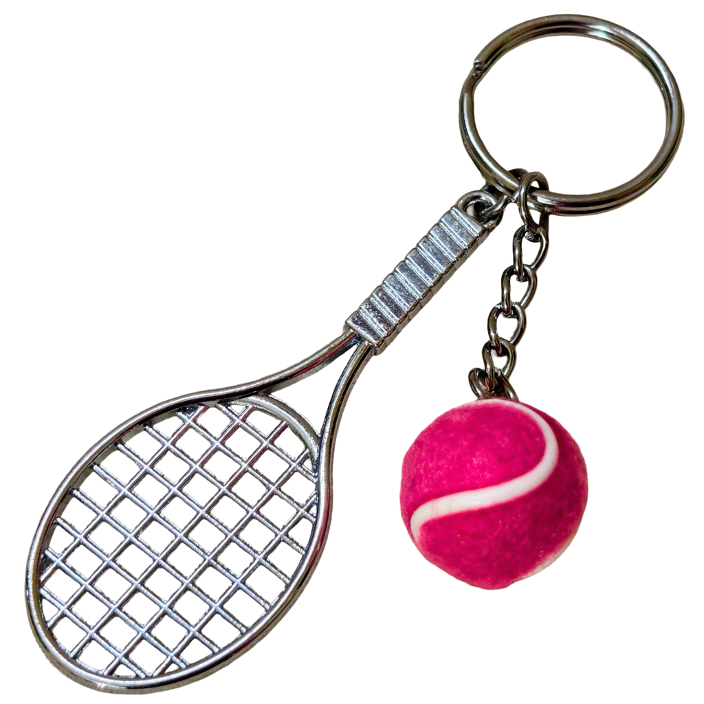 A novelty keychain shaped like a tennis racket with a small pink felt tennis ball charm on a white background.