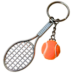 A novelty keychain featuring a silver metal tennis racket and a small orange tennis ball charm with a white seam, attached to a split ring on a plain white background.