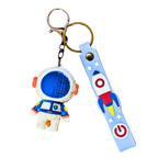 Keychain with astronaut and rocket design on a white background