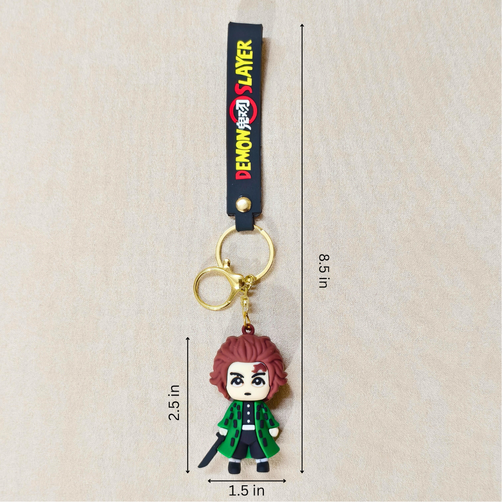 Keychain with character figure and 'Demon Slayer' branding, shown with measurements on a beige background.