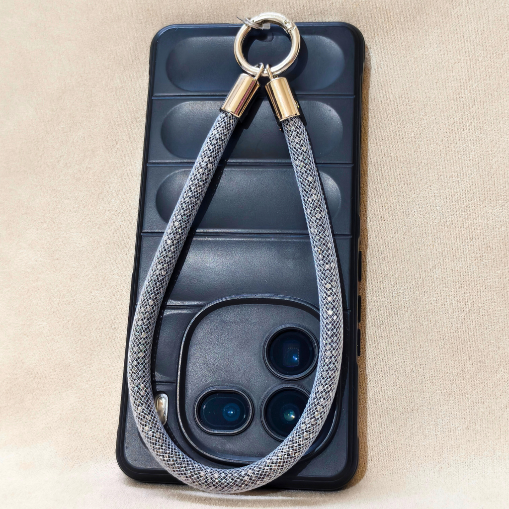 Phone case with a gray braided lanyard on a beige background