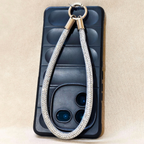 Measurement chart of a keychain with a rope-like strap on a beige background
