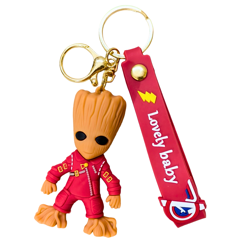 Keychain with a character in a red outfit and a red strap with 'Lovely baby' text on a white background