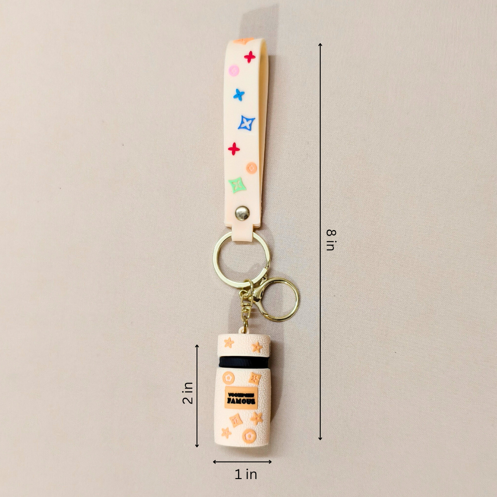 Keychain with colorful strap and dimensions on a beige background