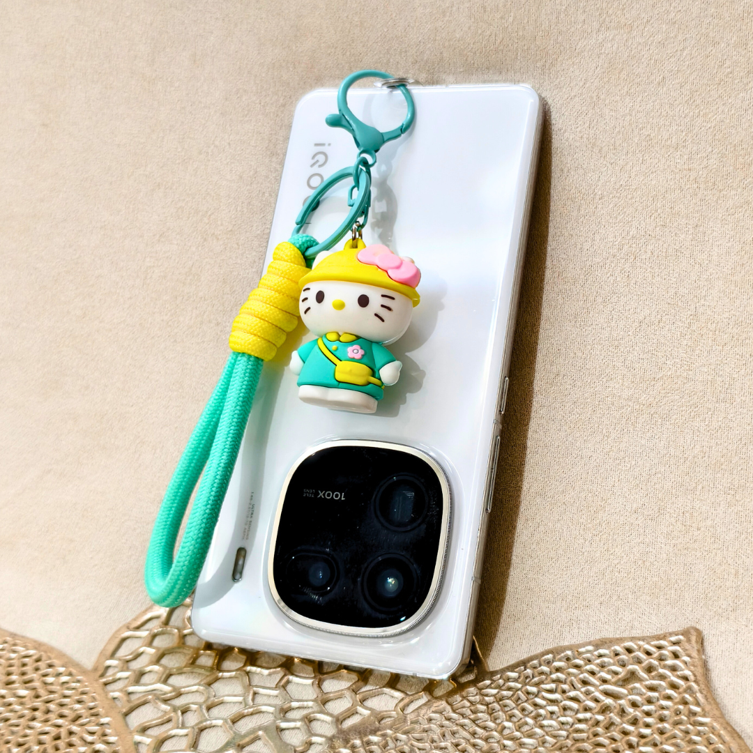 Phone case with a character charm on a beige background