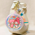 Keychain with cartoon characters on a beige background