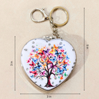 Heart-shaped keychain with a colorful butterfly tree design on a white background, shown with dimension lines indicating 3 in by 5 in measurements.