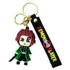 Keychain with character figure and 'Demon Slayer' strap on a white background