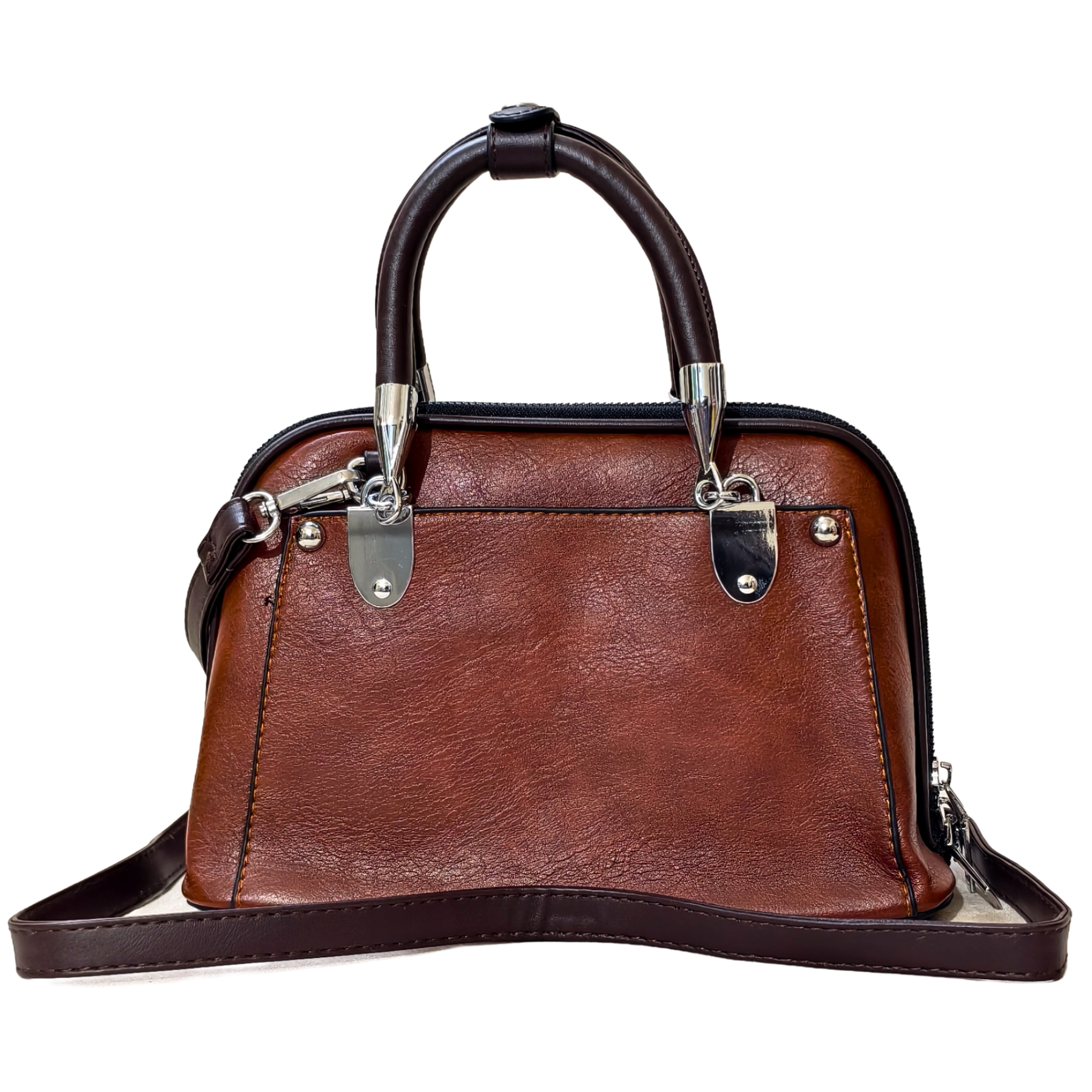 Brown leather handbag with silver hardware on a white background